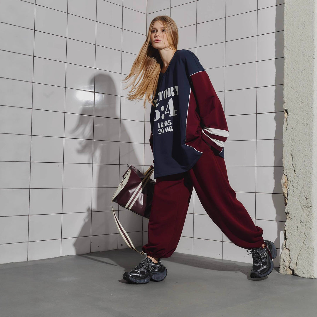 Kvinders oversized tracksuit med grafisk print og brede bukser Stilla