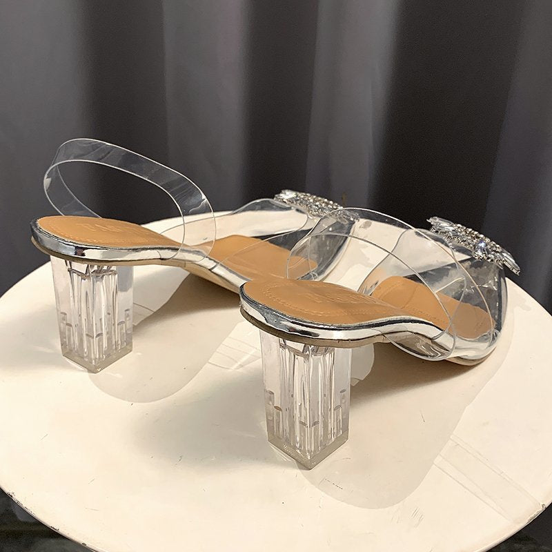 Dame Elegante Slingback-pumps med gennemsigtigt overmateriale og funkende smykkedetalje Stilla