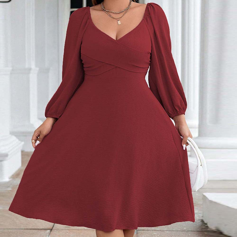 Dame Midi-kjole med elegant indviklingslook og puffærmer Stilla