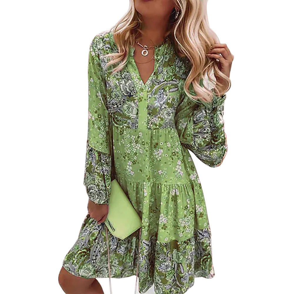 Dame fritidskjole i floral look med moderne V-udskæring og voluminøse ærmer Stilla