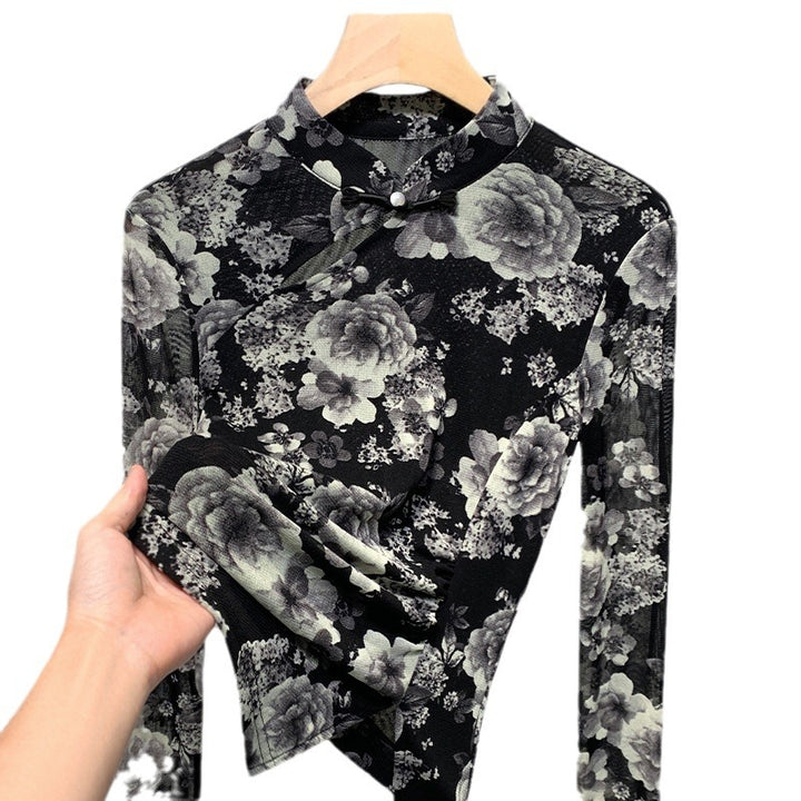 Dame elegant top med florale mønstre og raffinerede knapdetaljer Stilla