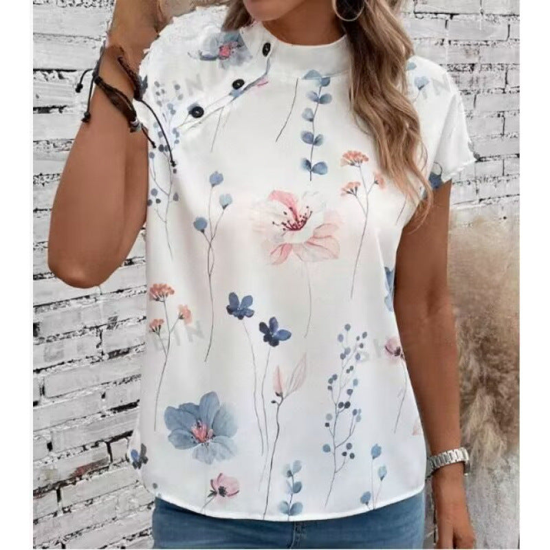 Damebluse med floraltryk og knapdetalje med korte ærmer Stilla