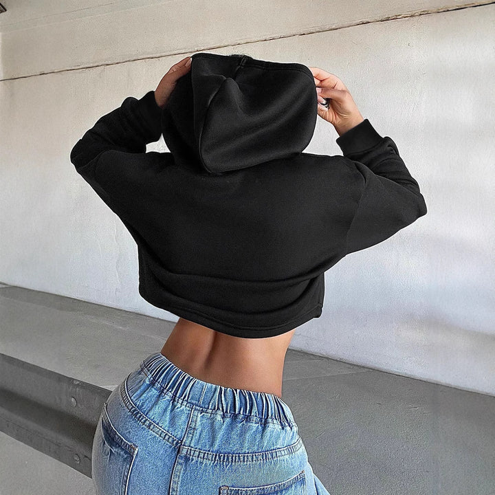 Kvinders cropped sweatshirt med en løs pasform og hætte Stilla