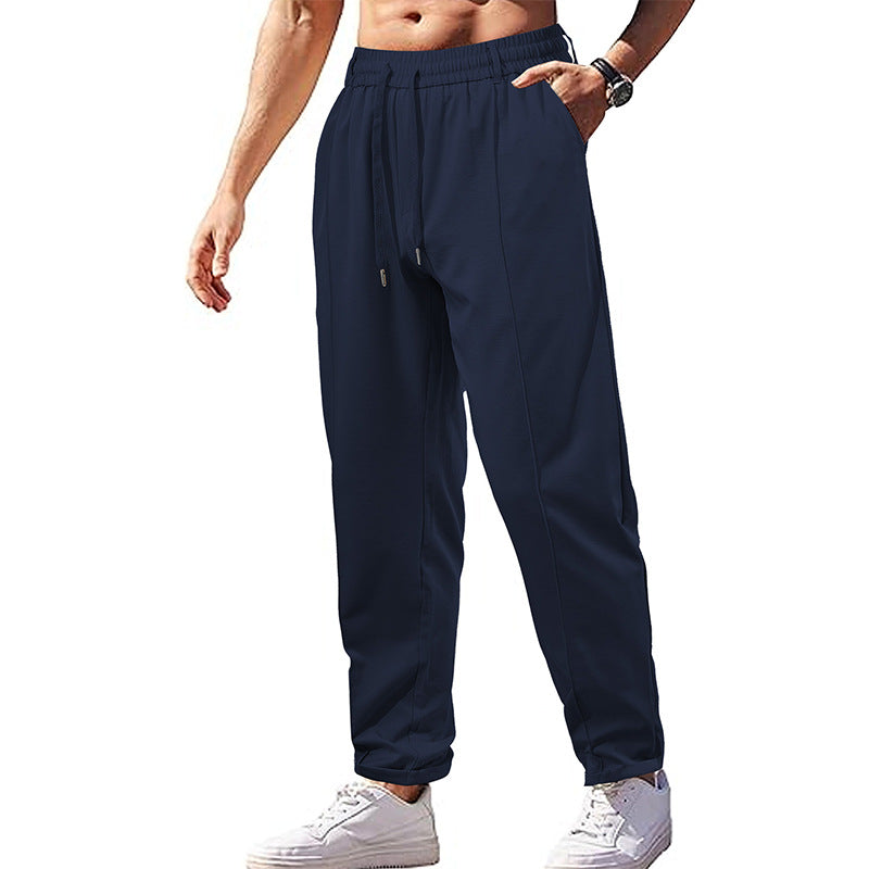 Herren Sporty Joggingbukser med elastisk linning og praktiske sidelommer Stilla