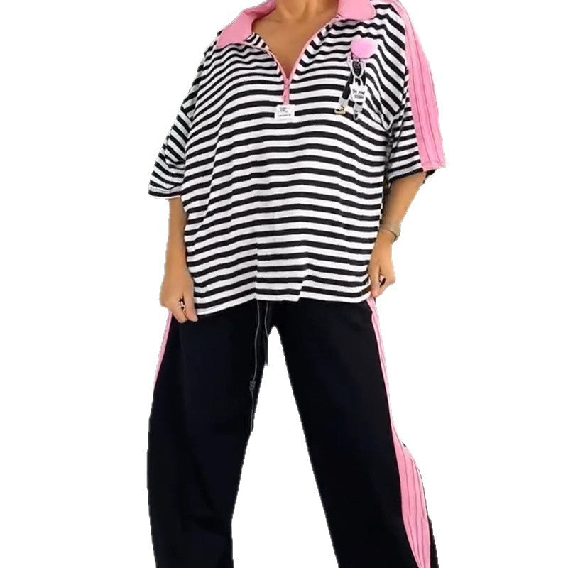 Dame overdimensioneret polo T-shirt med stribet design og modige accenter Stilla