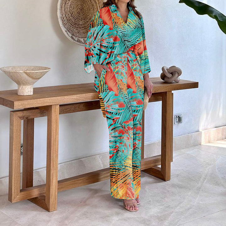 Dame Elegant og luftig strandkombination med florale mønstre Stilla