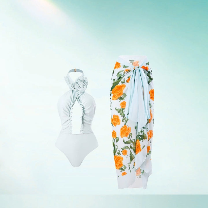 Dame badedragt med moderigtigt omslagskørt og blomstret design Stilla