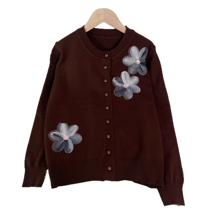 Dame cardigan med blomsterdesign og knaplukning Stilla