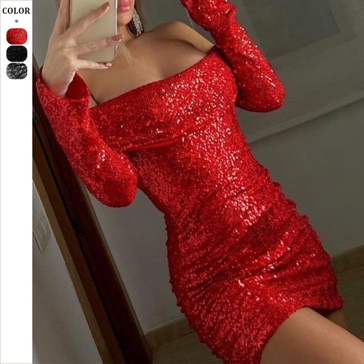 Dame glitterende aftenkjole med off-shoulder design og lange ærmer Stilla