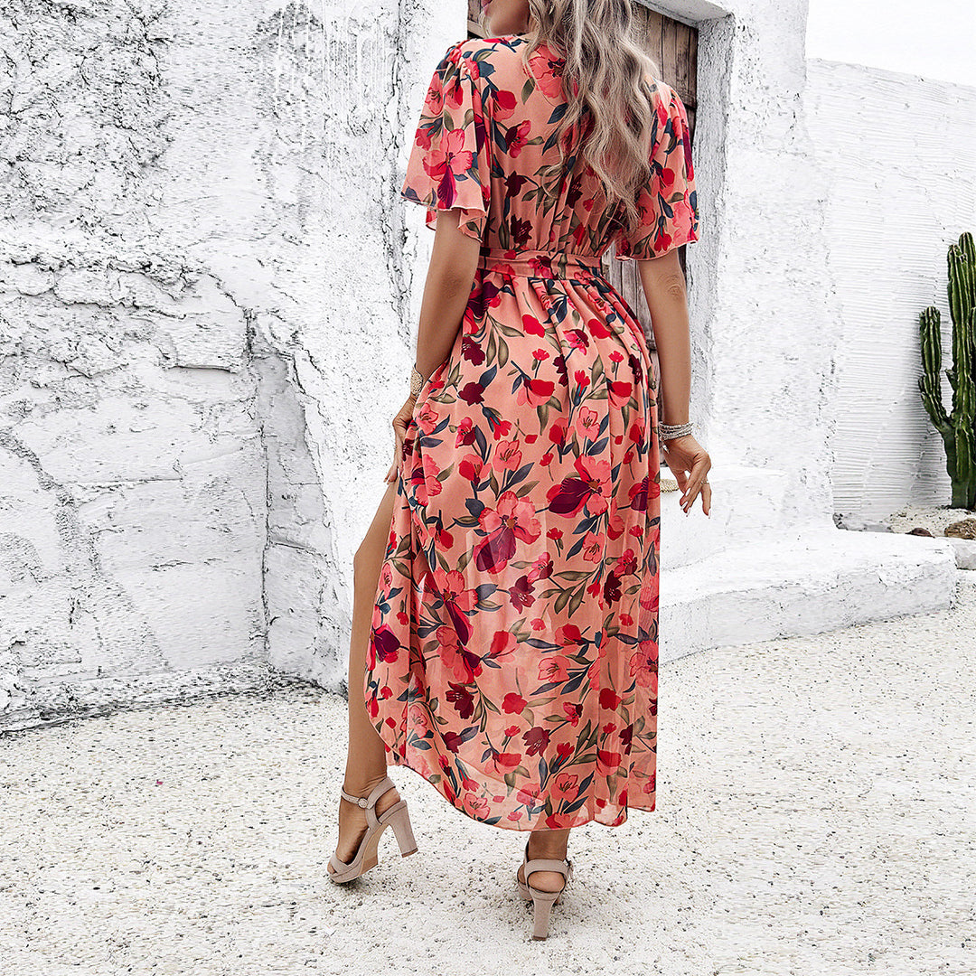 Dame maxikjole med blomsterdesign og sidet slids Stilla