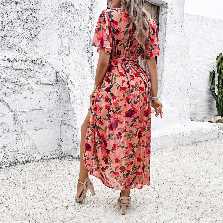Dame maxikjole med blomsterdesign og sidet slids Stilla