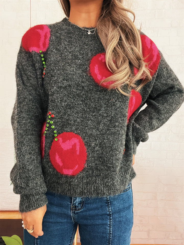 Kvinders hyggelige strikket sweater med blomsterapplikationer og glitrende accenter Stilla