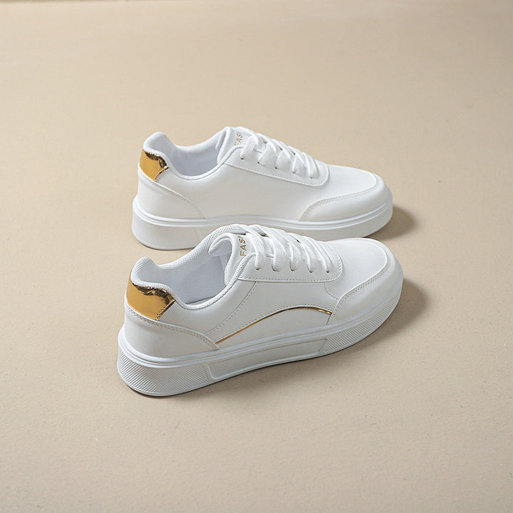 Dame Trendy Sneakers i minimalistisk design med elegante metallic-detaljer Stilla