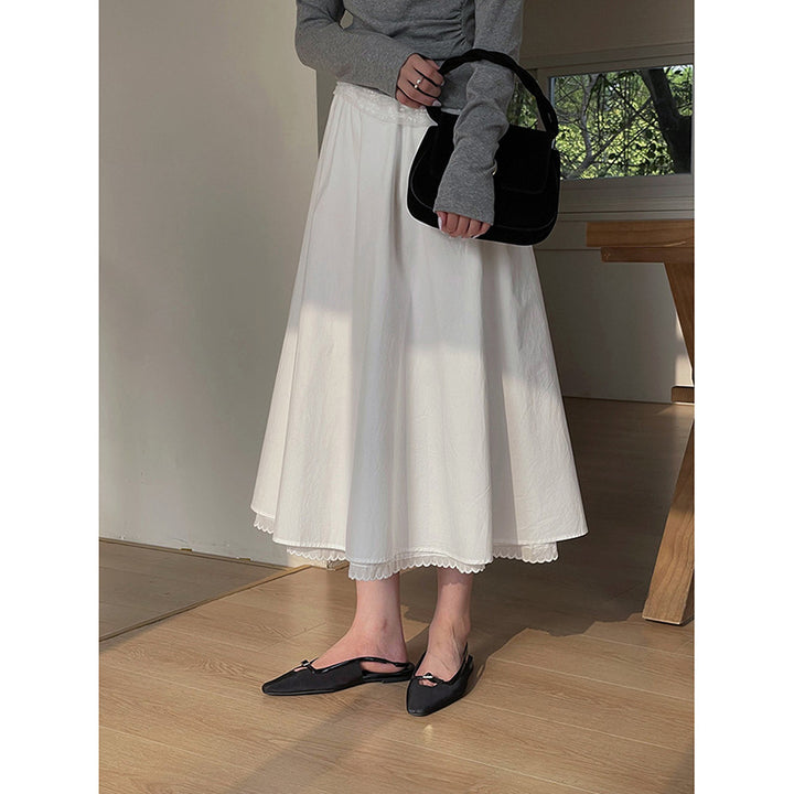 Dame plisseret med elegant spidsborte og flydende snit Stilla