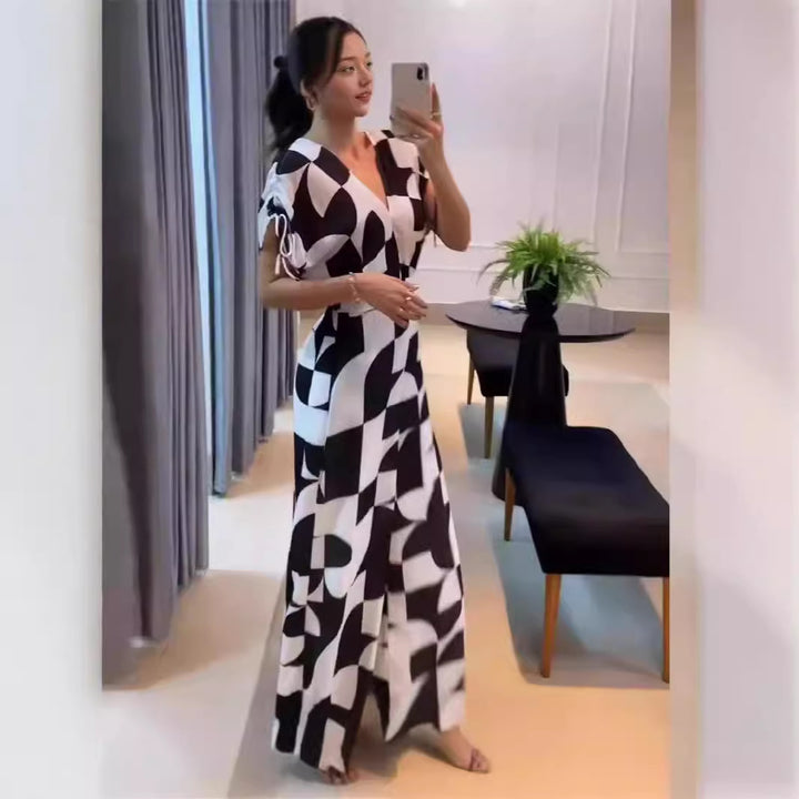 Dame Modet Jumpsuit med grafisk mønster og elegante ærmer Skovae