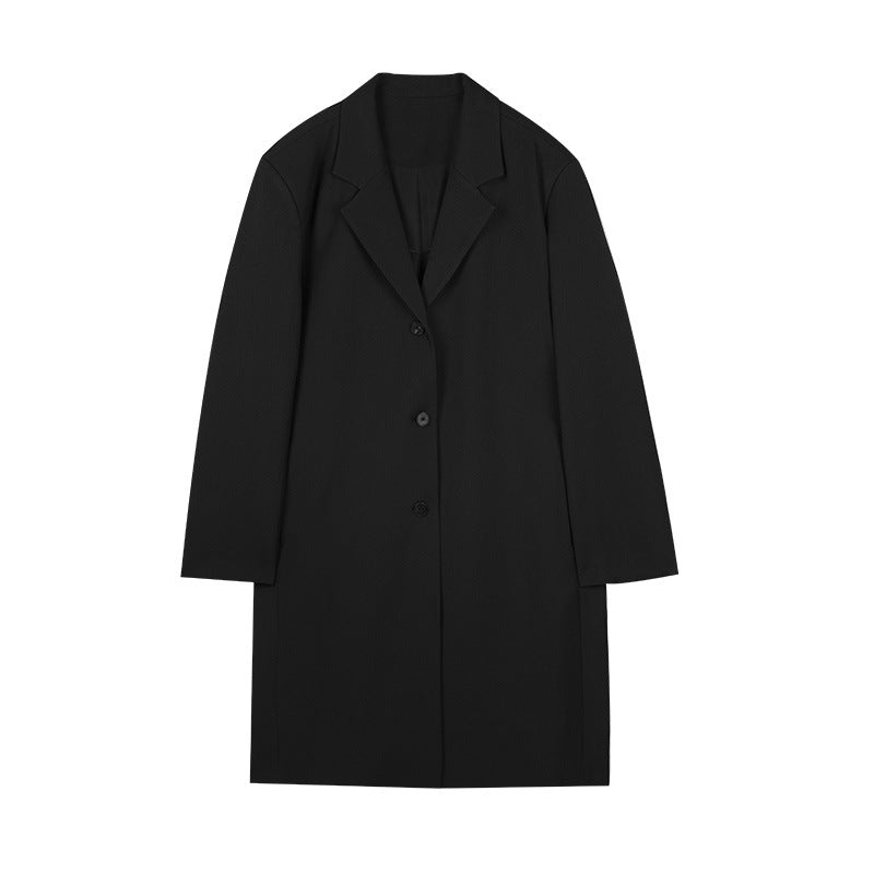Dame elegant Langjakke med klassisk revers og moderne knapdetaljer Stilla