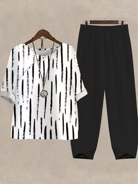 Dame nan lette fritidssæt med mønstret oversized skjorte og konisk tætsiddende komfortbukser Skovae