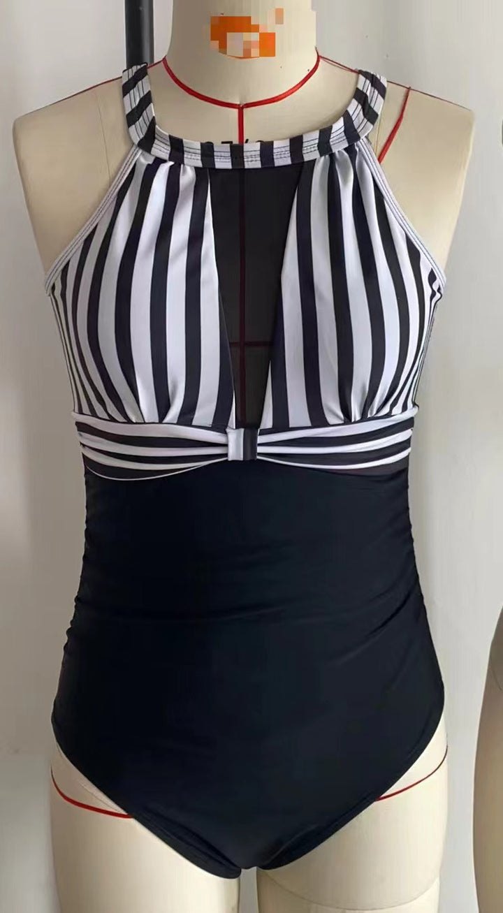 Dame Sporty Én-piece badedragt med raffineret mesh-detalje Skovae