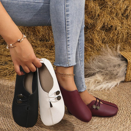 Dame Slip-On sko med moderigtigt knapdetalje og blødt overmateriale Stilla