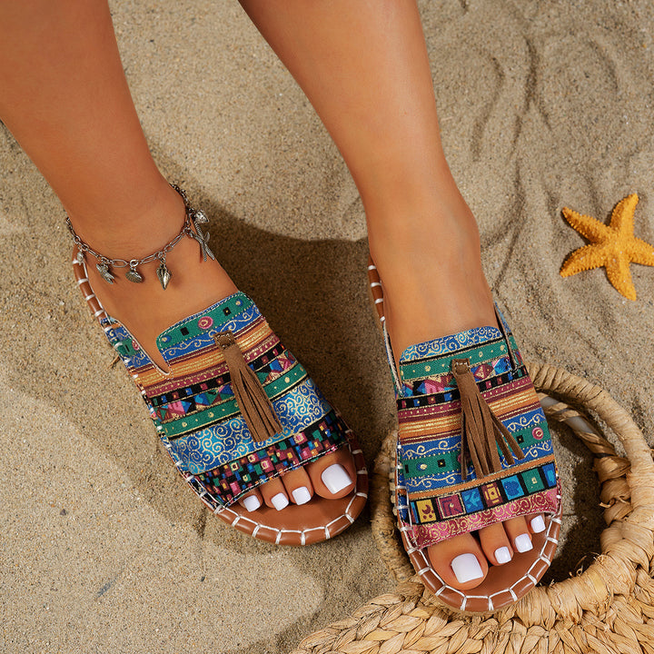 Dame slide-sandaler med farverigt vævdesign og fashionable kvaster Stilla