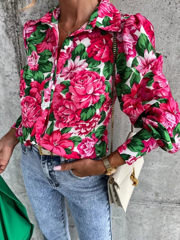 Damebluse med blomstret design og voluminøse ærmer Stilla