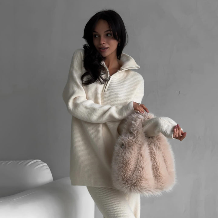 Kvinders komfortable strikket pullover med halv lynlås og ribbet design Skovae