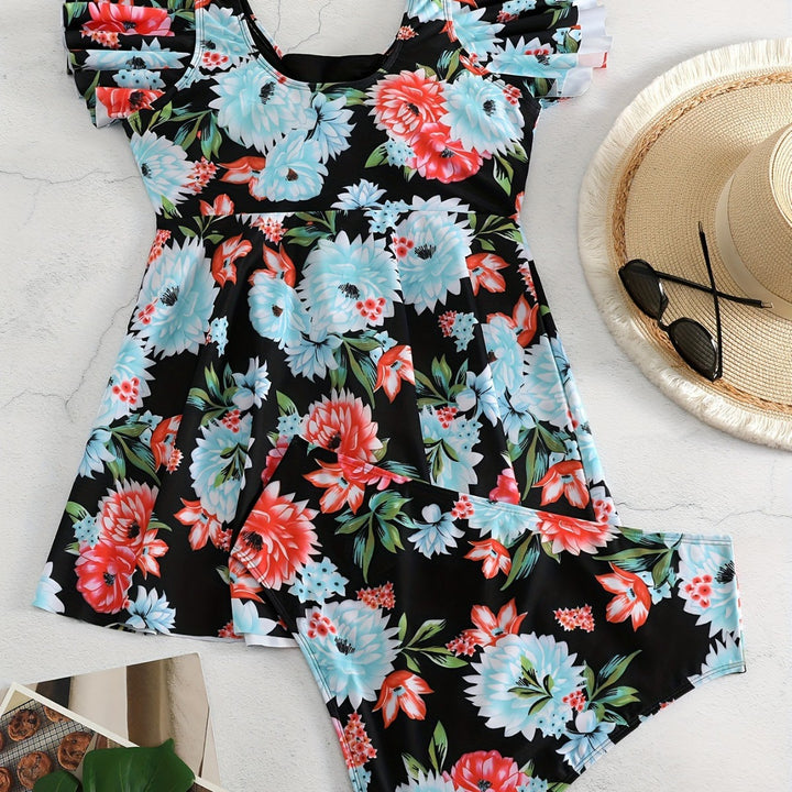 Dame én-delt badedragt med ruffledetails og blomstret design Skovae