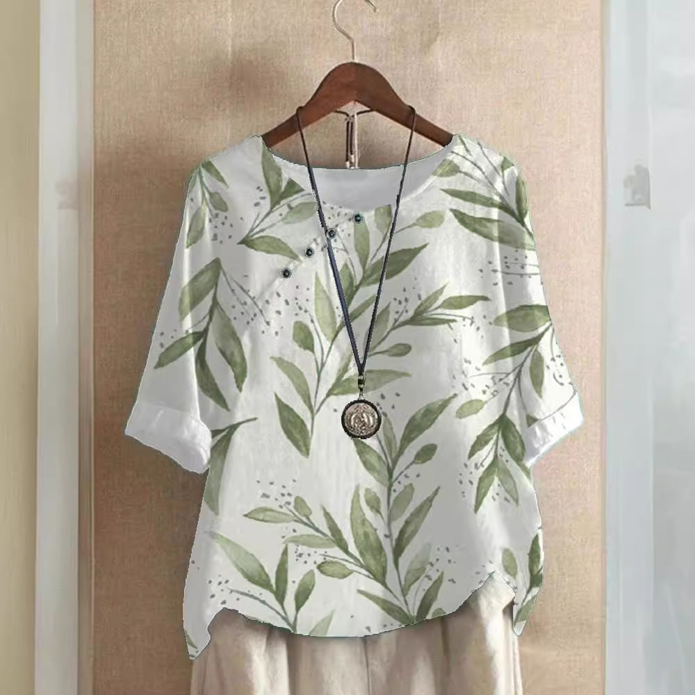 Damer bomuldsbluse med blomstertryk og elegant knaplukning Stilla