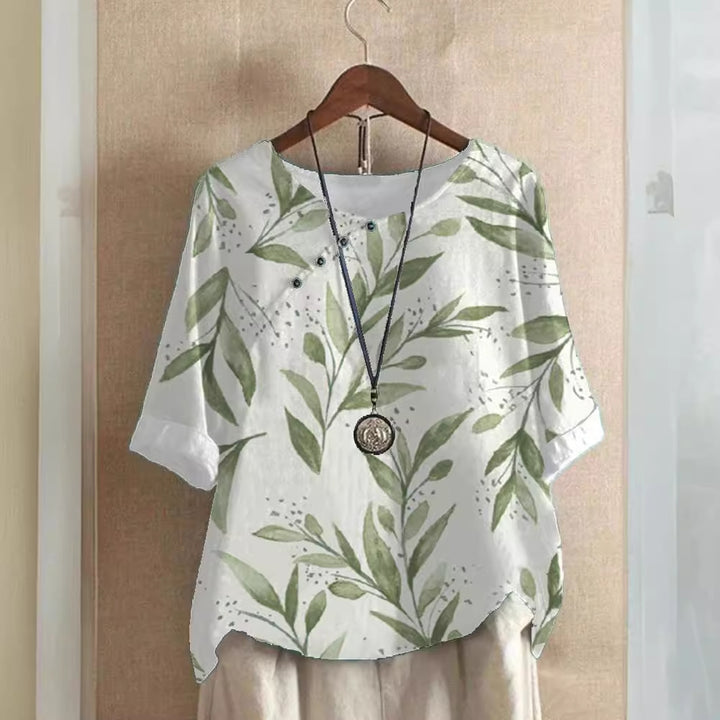 Damer bomuldsbluse med blomstertryk og elegant knaplukning Stilla