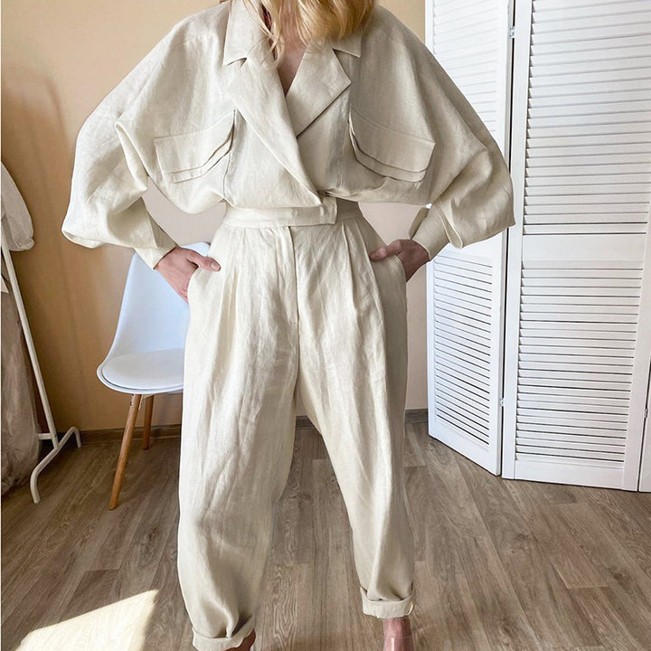 Kvindernes fashionable linned jumpsuit med voluminøse ærmer og elegant bælte Stilla