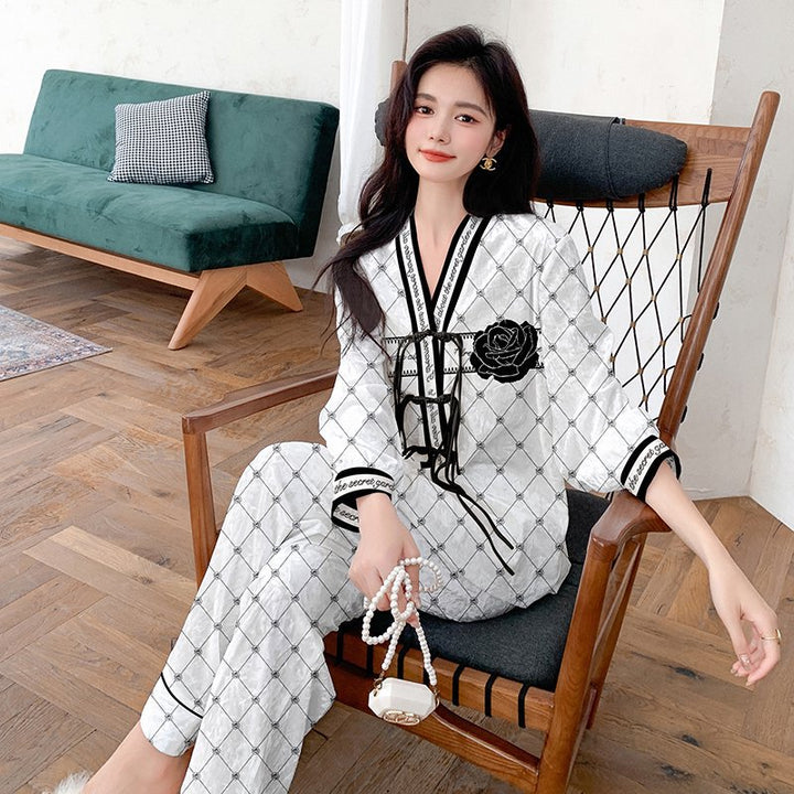 Dame luksus natwear sæt med blomstermønster og elegant design Stilla