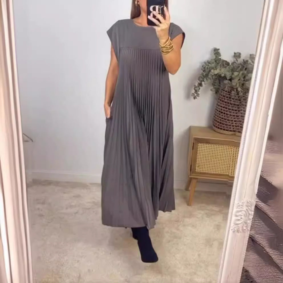 Dame Plisse Maxikjole med sidelommer og elegant rund halsudskæring Stilla