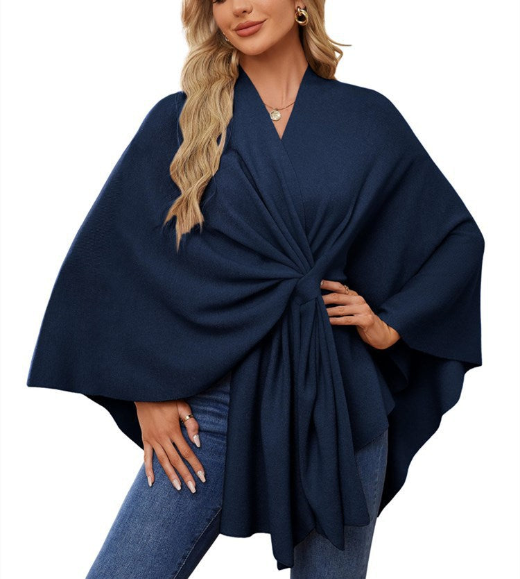 Dame elegant strikkeponcho med raffinerede draperinger og taljebælte Stilla