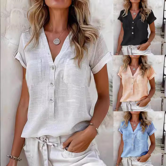Dame elegant kortærmet bluse med knapdetaljer og praktiske brystlommer Stilla