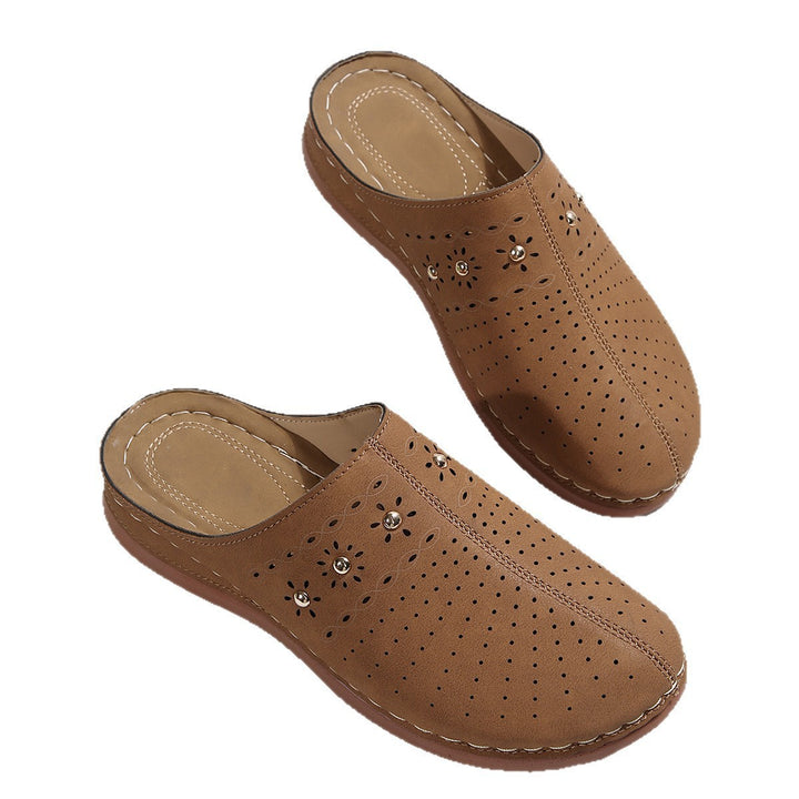 Dame Komfortable Clogs med fashionable perforeringsdesign og dekorative accenter Stilla