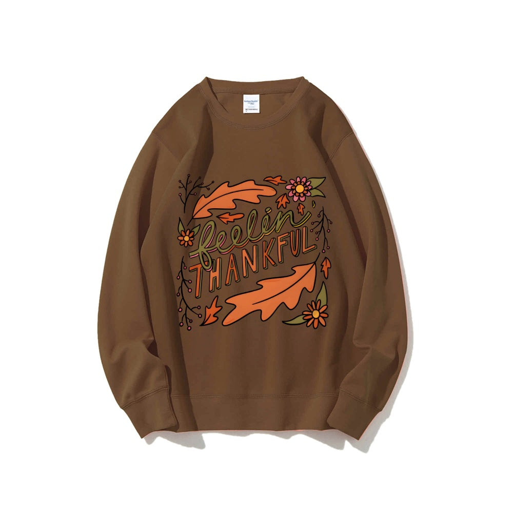 Kvinders sweatshirt med farverigt efterårsdesign og inspirerende tekst Stilla