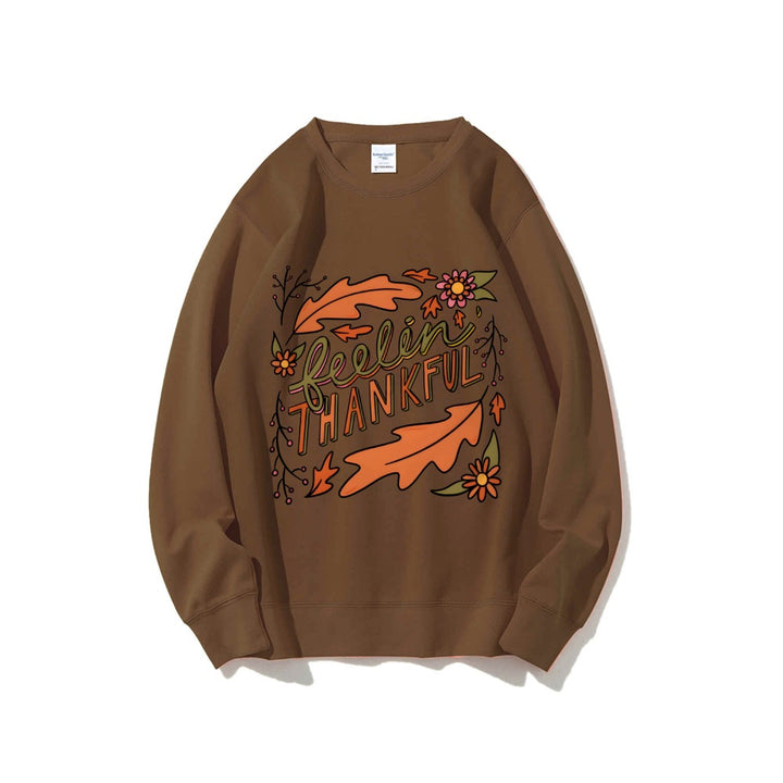 Kvinders sweatshirt med farverigt efterårsdesign og inspirerende tekst Stilla