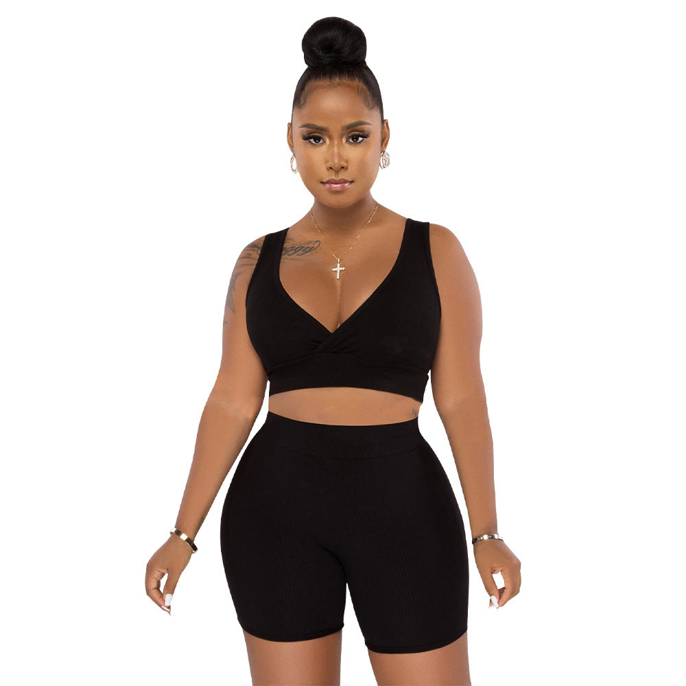 Dame Sporty Sæt af Cropped Top og Cykelshorts med Ribstruktur Stilla