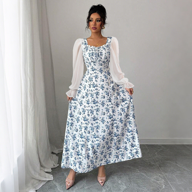 Dame Maxikjole med transparente pufærmer og blomsterdesign Stilla