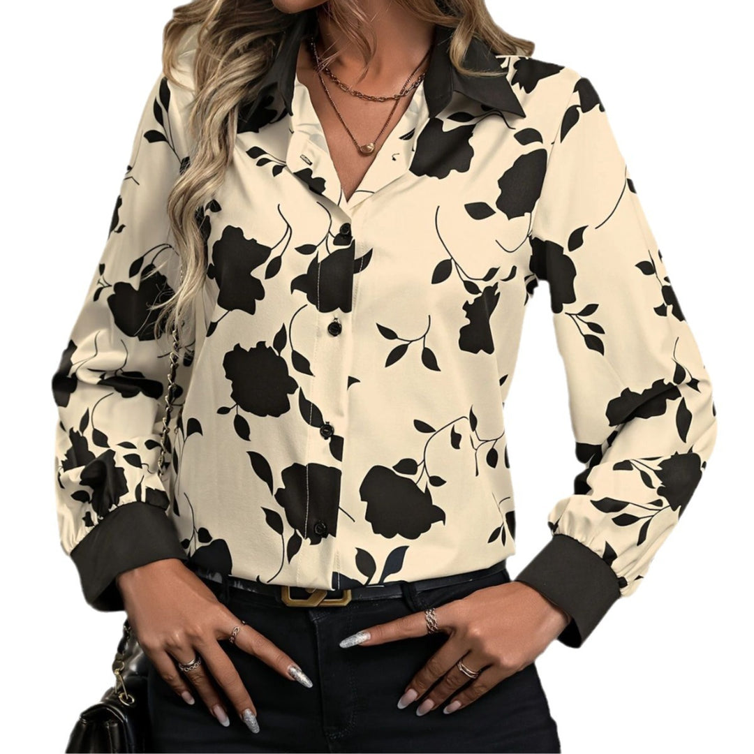 Damebluse i elegant blomsterdesign med moderne krave Stilla