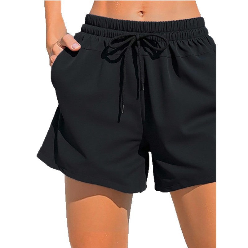 Dame Sportslige Badshorts med elastisk talje og praktiske lommer Skovae
