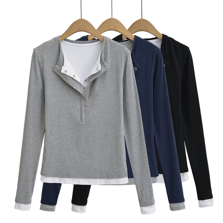 Dame langærmet Henley-shirt med fashionable knapdetaljer og elegant snit Stilla