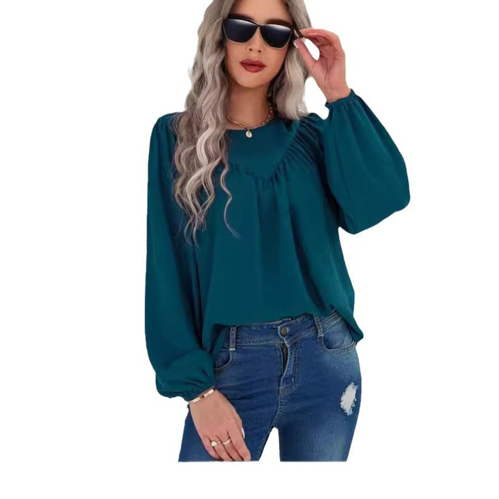Damebluse med voluminøse ærmer og dekorative folder Stilla