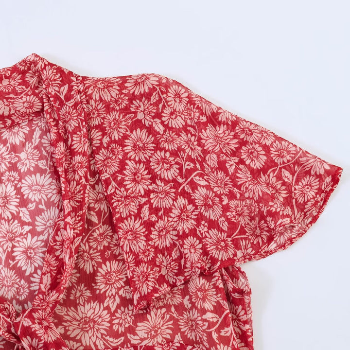 Dame maxikjole med florale detaljer og feminint snit Skovae