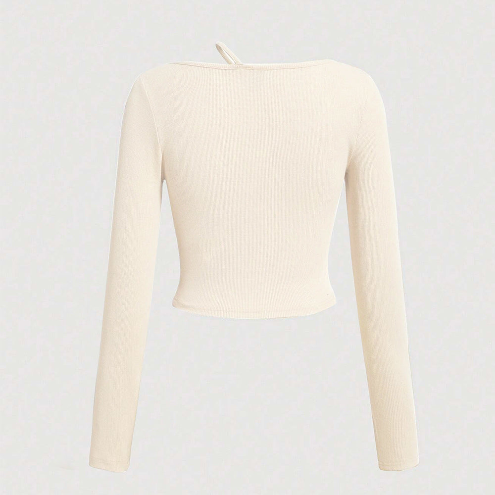 Kvindernes langærmede cropped skjorte med asymmetrisk halsudskæring og fin ribbet tekstur Stilla