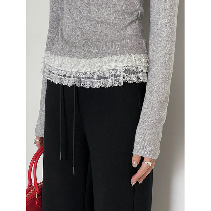 Dame longsleeve med dekorativt flæse detaljer og raffineret design Stilla