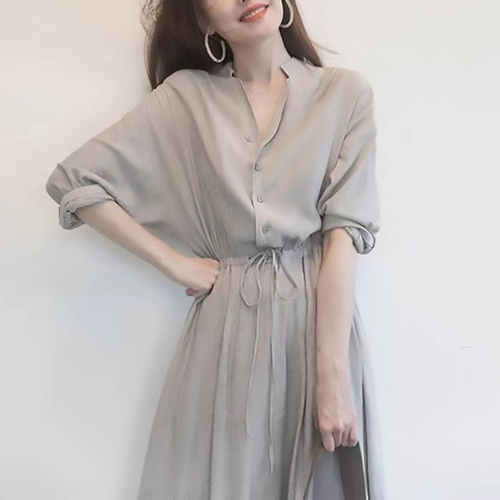 Damebluse med taljerbar knude og elegante detaljer Stilla