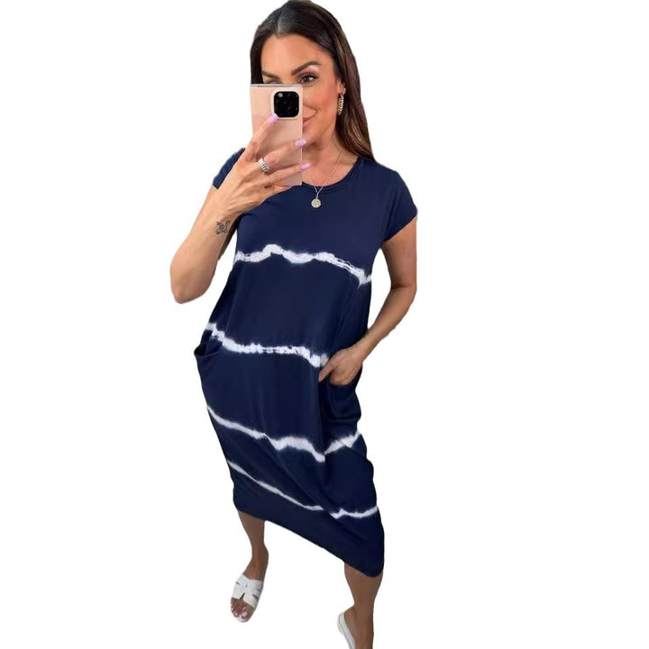 Dame fritidkjole med praktiske lommer og moderne batiklook Stilla