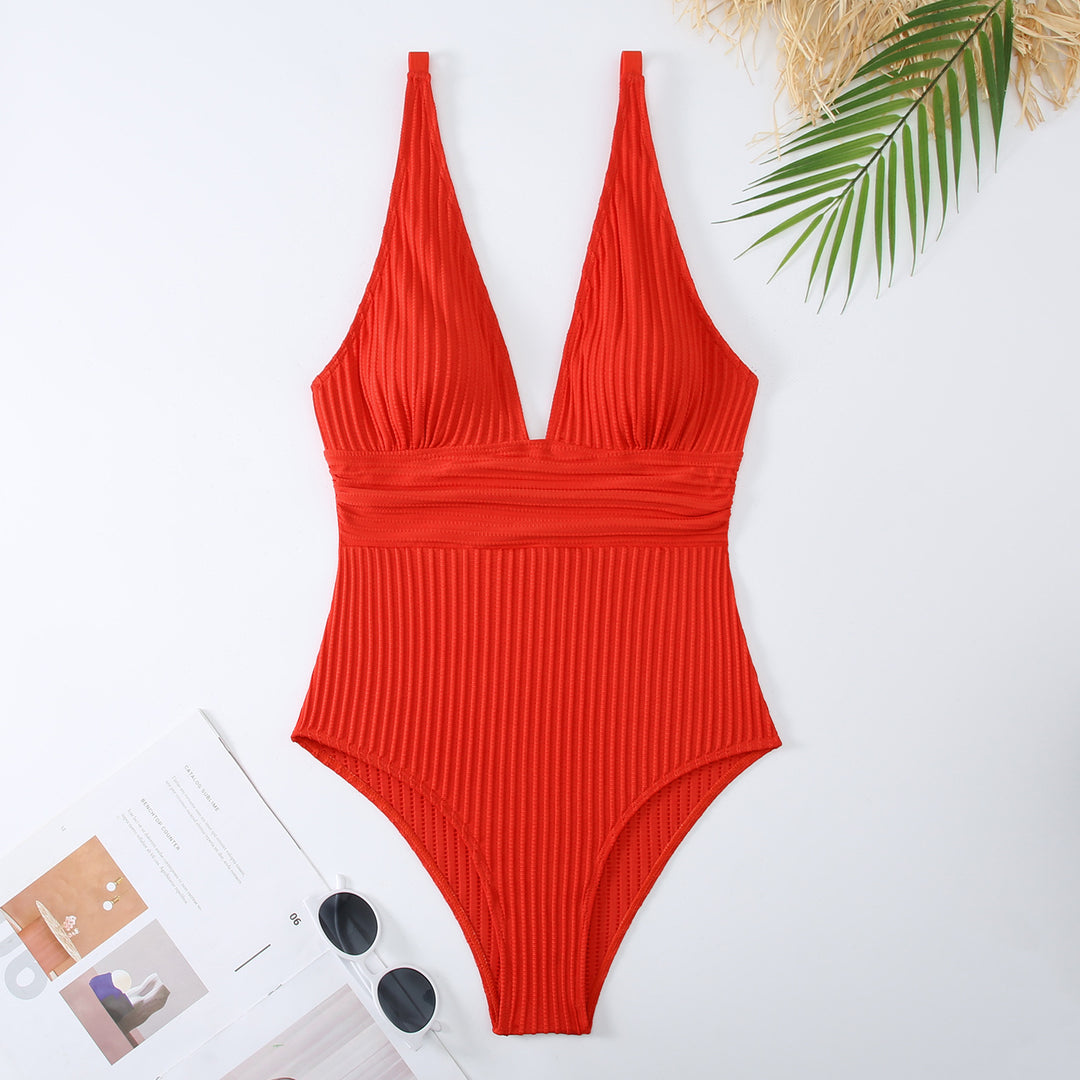Dame onepiece badedragt med sporty ribbemønster og dyb V-udskæring Stilla