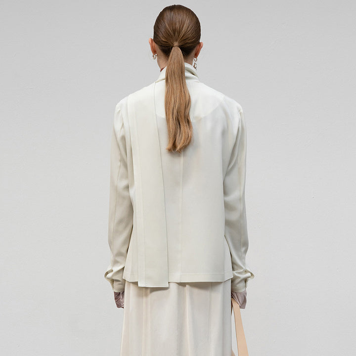 Dame elegant bluse med asymmetrisk snit og kvalitets knapdetaljer Stilla